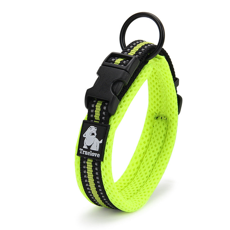 Neon yellow reflective dog collar with breathable mesh padding and black quick-release buckle.