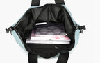 This is a view of the inside of the tote backpack. It shows the interior compartments and pockets.