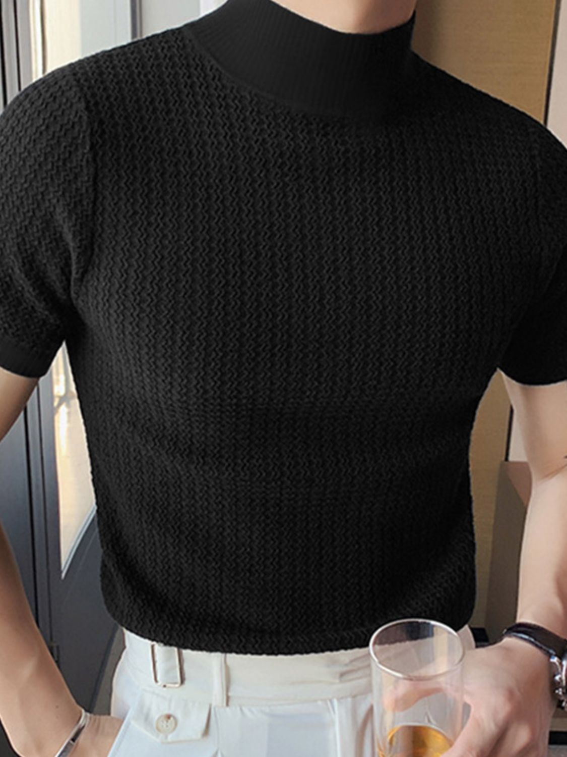 Black mock neck short sleeve t-shirt styled casually