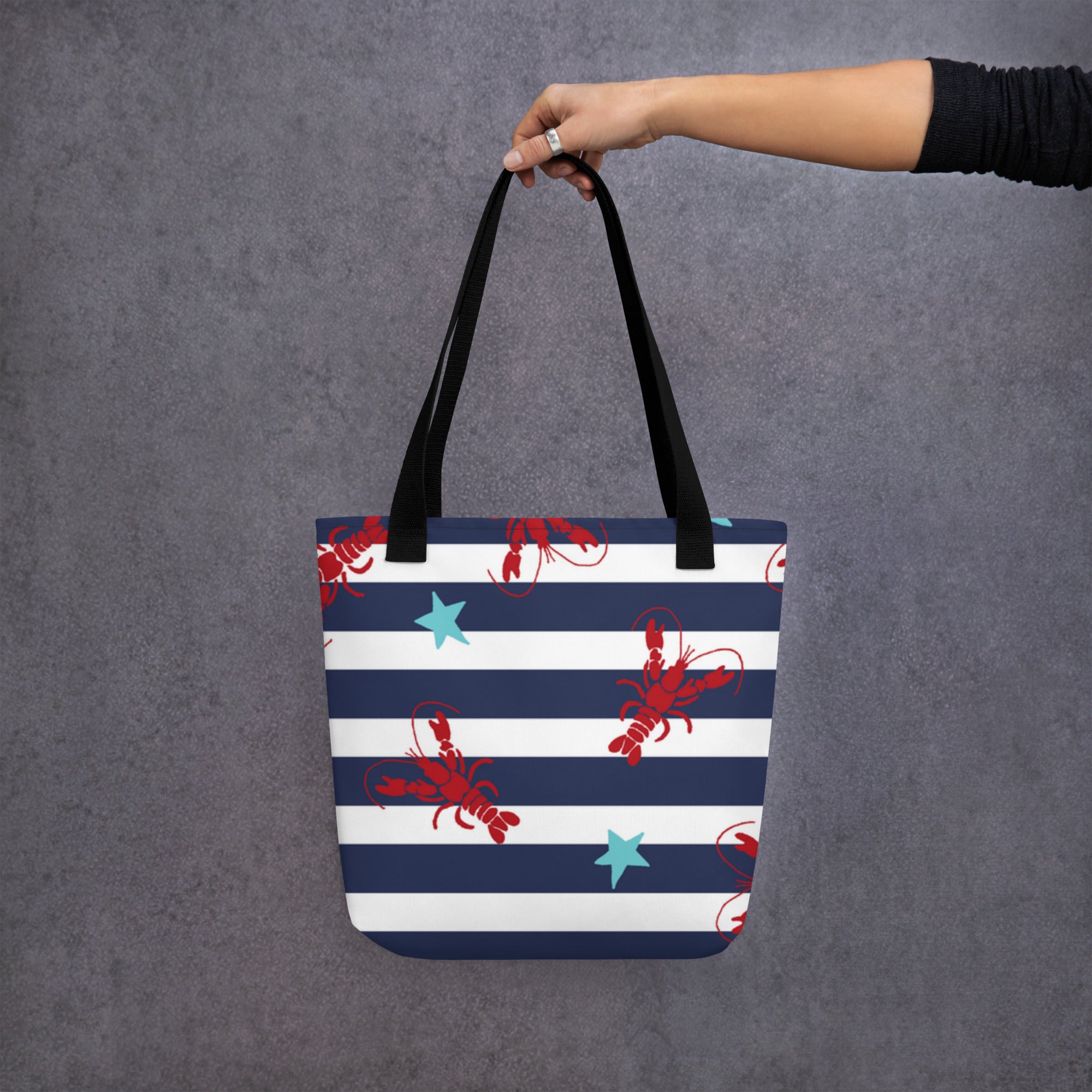 Side view of tote bag featuring nautical lobster design
