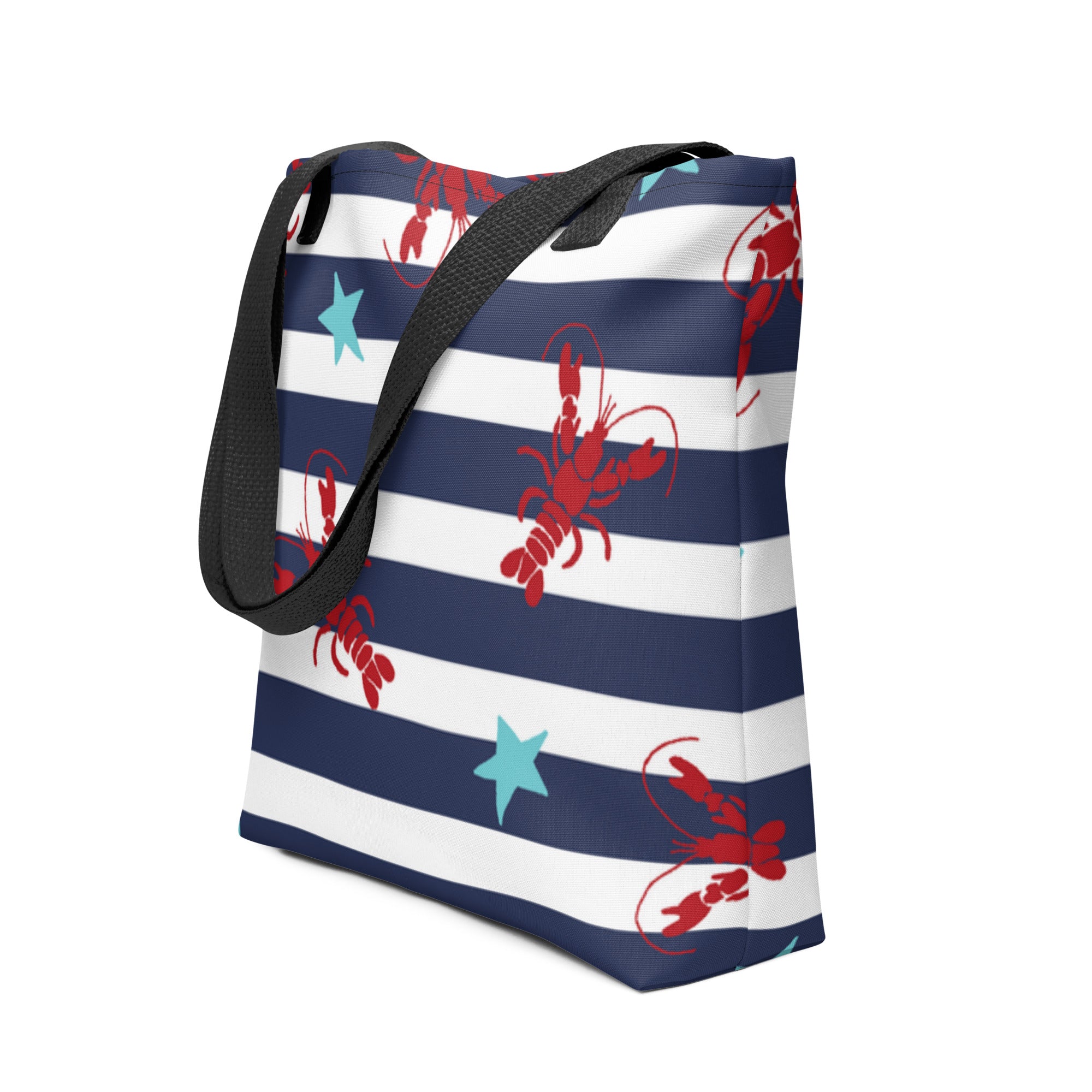 Tote bag with red lobster and starfish design on navy striped background