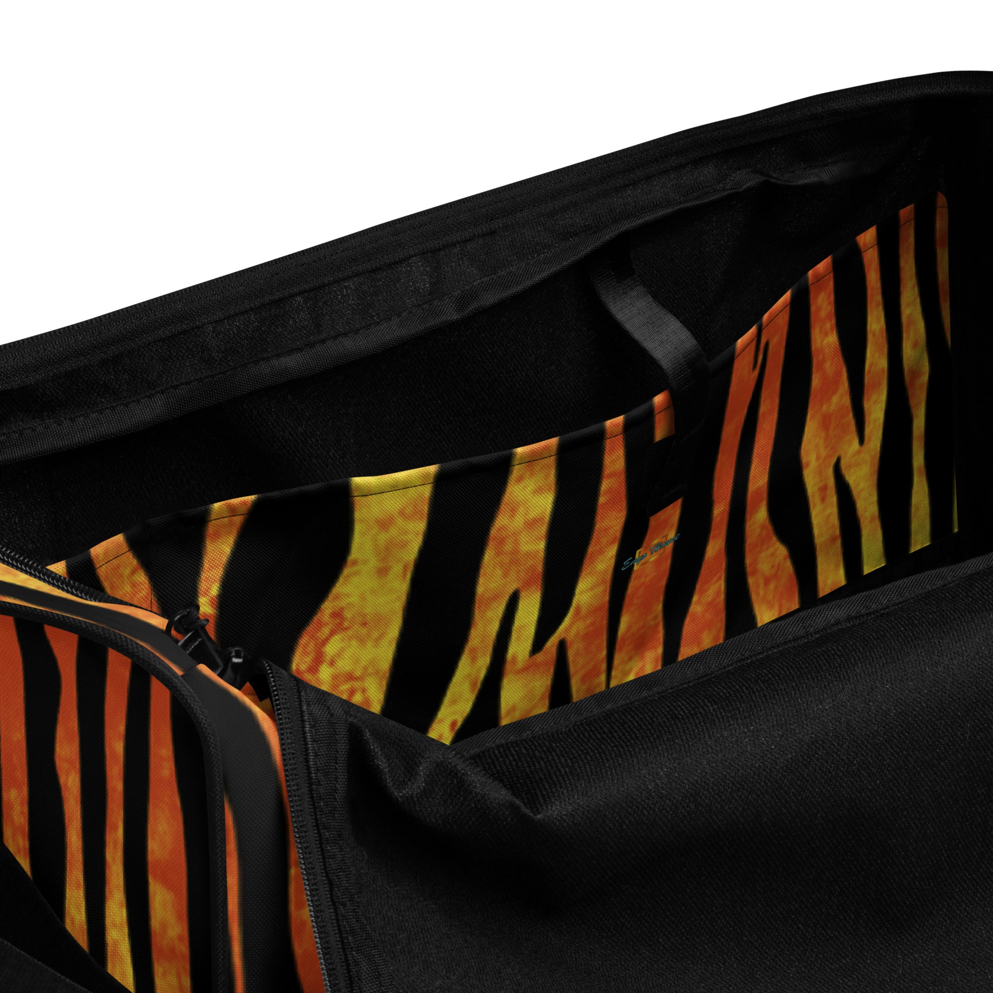 Unzipped duffle bag showing interior compartments
