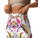 Women's high-waist yoga leggings featuring a vibrant floral print on a white background with enyohouse logo. Showing the inner pocket. Soft, stretchy, and perfect for workouts, yoga, and activewear fashion
