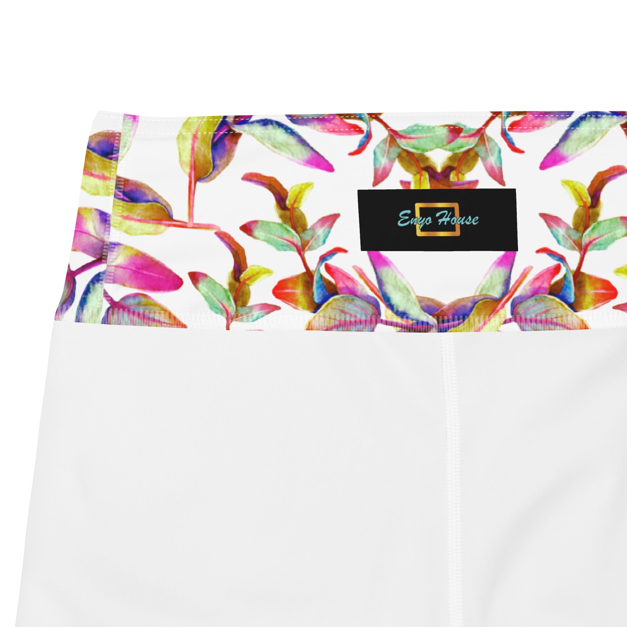 Women's high-waist yoga leggings featuring a vibrant floral print on a white background with Enyohouse logo. Soft, stretchy, and perfect for workouts, yoga, and activewear fashion