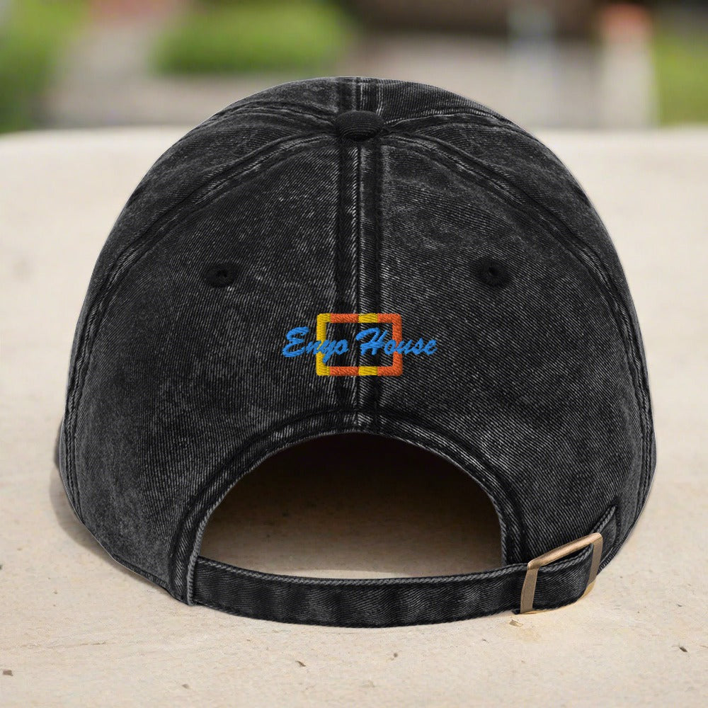 A stylish black Vintage hat with Enyohouse Logo embroidered on the back of the hat. Perfect for a cool and confident look.