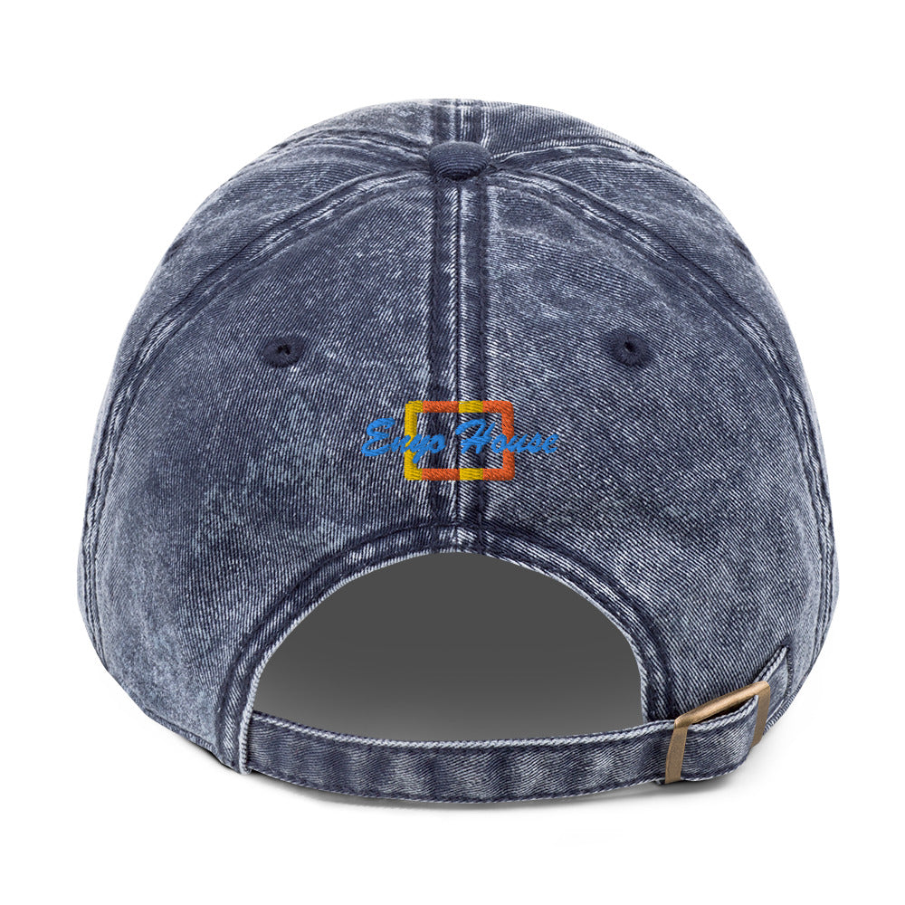 enyohouse embroidery on a navy color hat