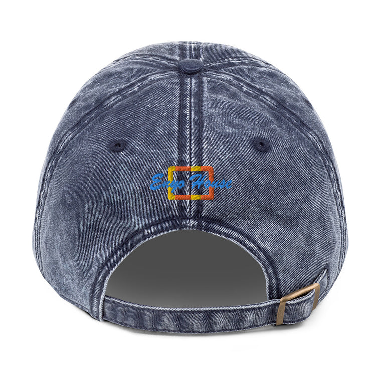 enyohouse embroidery on a navy color hat